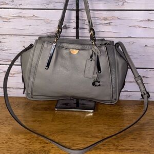 Gray Leather Coach dreamer bag.